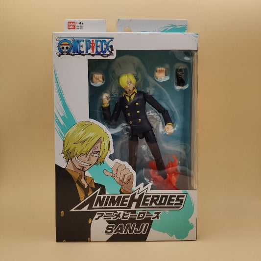action figure sanji, personaggio in vestito nero, scatola bianca e verde
