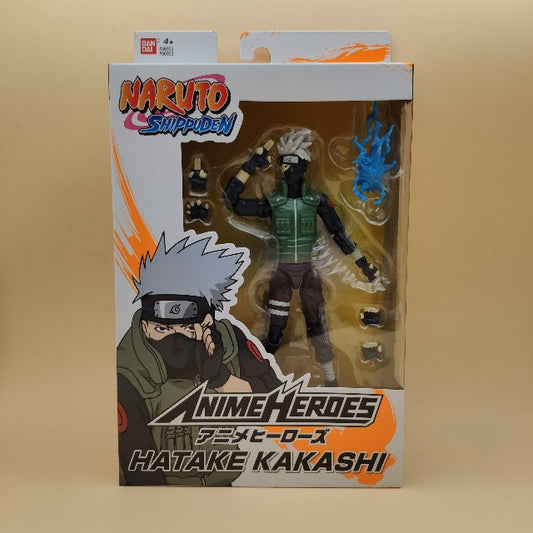 action figure kakashi,naruto shippuden,parti intecambaibili,scatola bianca arancione, personaggio costume nero e verde