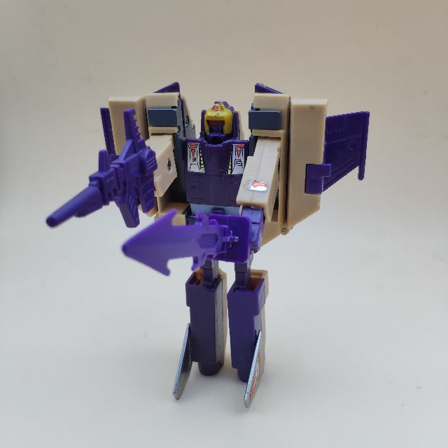 blitzwing diaclone transformers della hasbro 1985, robot con tre trasformazioni, robot color sabbia e viola
