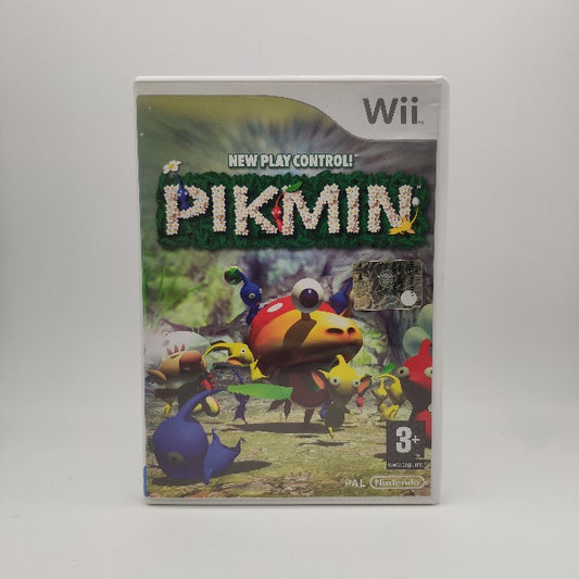 sfondo terreno grigio,verde, personaggi pikmin che si muovono giallo,blu,rosso