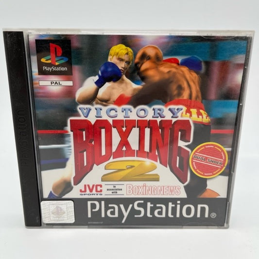 uomini che combattono su ring da boxe