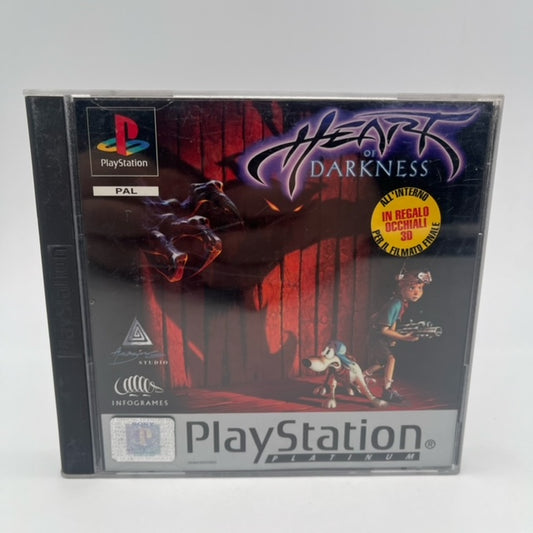 heart of darkness ps1 , bambino con strano fucile e cane con cappello con ombra mostruosa dietro di loro