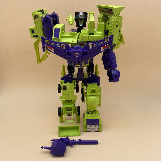 trasformers devastator, decepticon, 1980-84, robot componibile, mezzi da lavoro, verde fluo, verde acido, viola