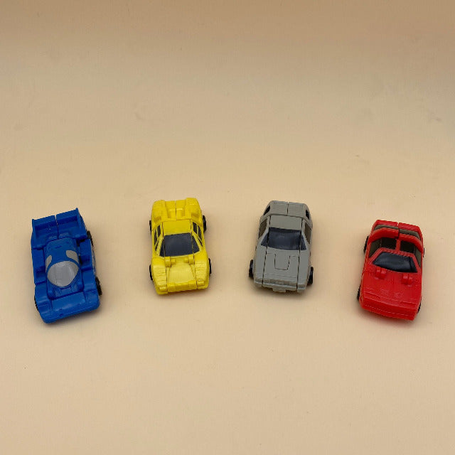 macchine rosso, grigio, giallo e blu