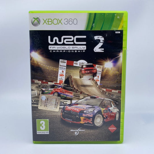 WRC 2 Fia World Rally Championship X360 Xbox 360 Pal Ita, macchine da rally in copertina su percorso all'interno di un autodromo
